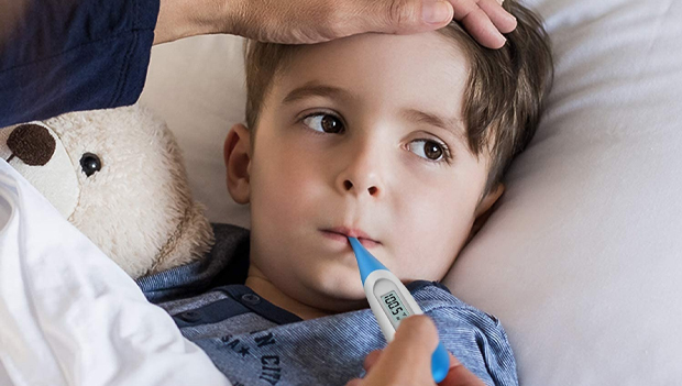 Child having his temperature taken with Boncare Digital Oral Thermometer