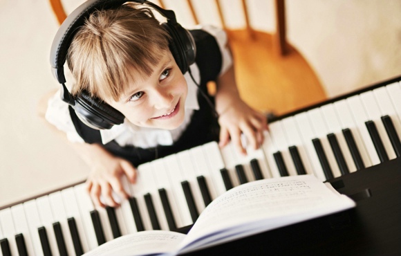girl playing piano